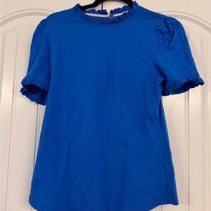 Boden ruffle collar  
Royal blue shirt
